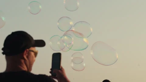 Soap bubbles above Zadar Stock Footage 340627064
