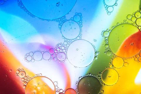 Soap bubbles against abstract background Stock Photos