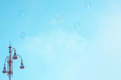 Soap bubbles against sky Stock Photos