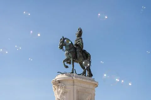 Soap bubbles in the air with historical structures in the background Stock Photos