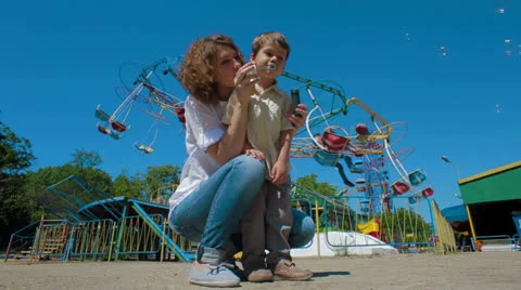 Soap Bubbles In Amusement Park Stock-Footage 26184695