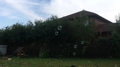 Soap bubbles are flying up slowly Stock Footage 201836710