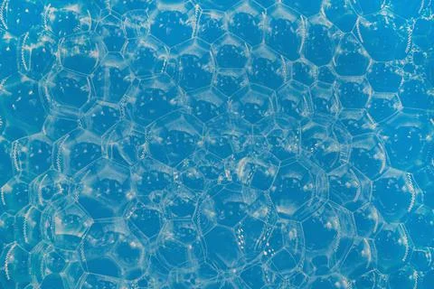Soap bubbles background. Shampoo foam. Bubbles in the water Stock Photos
