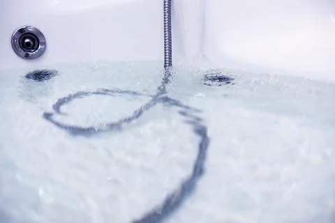 Soap bubbles background. Shampoo foam in the water in the bathroom. Jacuzzi.. Stock Photos