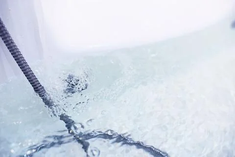 Soap bubbles background. Shampoo foam in the water in the bathroom. Jacuzzi.. Stock Photos