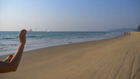 Soap bubbles on the beach Stock Footage 93918277