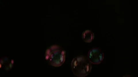 Soap bubbles on black background Stock Footage 70247937