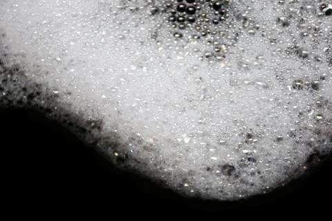 Soap bubbles on a black background. Stock-Fotos