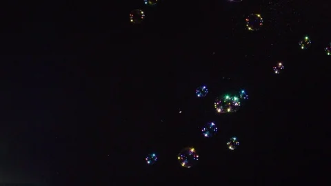 Soap bubbles on black background slow motion Stock Footage 107534562