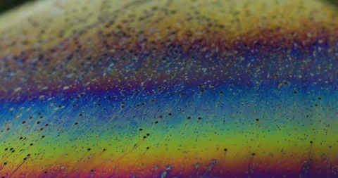Soap bubbles closeup. Art abstract vibrant colorful background. Stock Footage 128490956