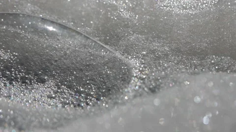 Soap Bubbles Fall On The Foam And Burst Stock Footage 62742409