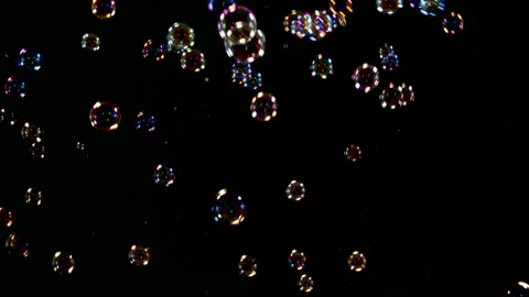 Soap Bubbles Falling Over Black Background 1 Stock Footage 163229351
