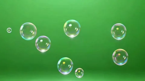 Soap bubbles floating Delicate against a vibrant green background Stock Footage 321288779