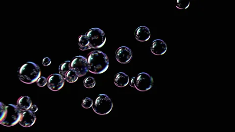 Soap Bubbles Fly Up and Burst on a Black Background Stock Footage 135251663