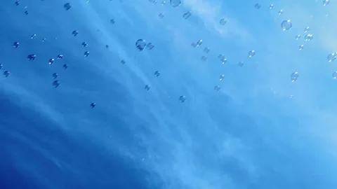 Soap Bubbles Flying On Blue Sky, background for your screen Stock Footage 278235465