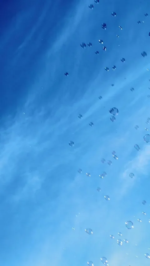 Soap Bubbles Flying On Blue Sky, background for your screen Stock Footage 278348214