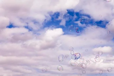 Soap Bubbles Flying In A Gust Of Wind Stock Photos