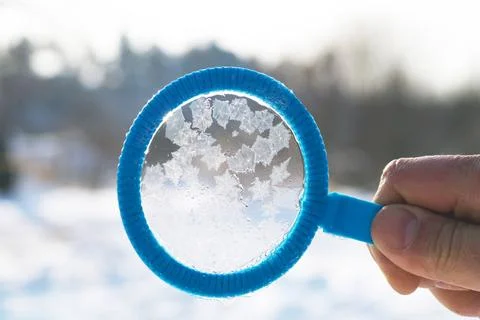 Soap bubbles freeze outside in the cold Stock Photos