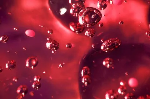 Soap bubbles on green background, abstract background. Stock Photos