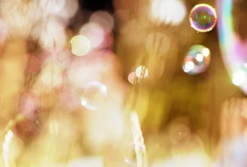 Soap bubbles on a green background Stock Photos