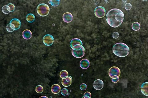 Soap bubbles on green background Foto stock