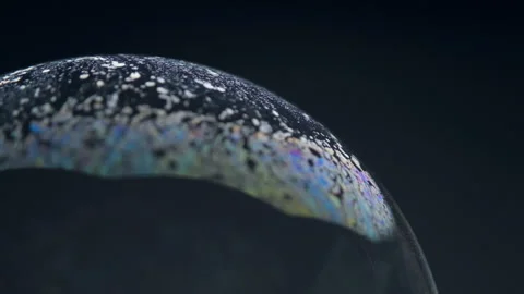 Soap bubbles isolated on black background. Soap bubbles in motion background. Stock Footage 201992105