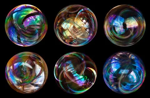 Soap bubbles isolated on black background Stock Photos