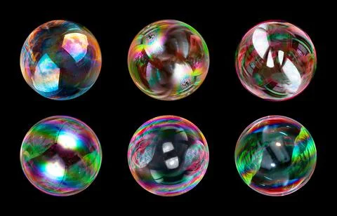 Soap bubbles isolated on black background Stock Photos