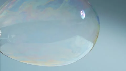 Soap Bubbles Isolated on Blue Background Stock Footage 259172438