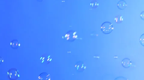 Soap bubbles on light blue, background Stock-Footage 53018775