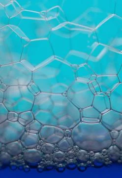 Soap bubbles macro forming hexagonal pattern Stock Photos