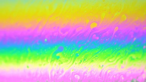 Soap bubbles macro motion. Rainbow colors. Moving surface of colorful bubbles Stock Footage 114541904