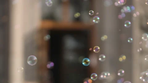Soap bubbles move chaotically in the air. Stock Footage 138760974