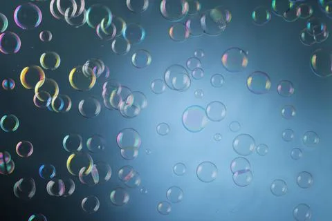 Soap Bubbles Real soap bubbles floating mid-air over blue background. Copy... Foto stock