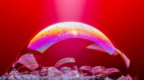 Soap bubbles on a red background, close-up, copy space, macro, pattern, textu Stock Photos