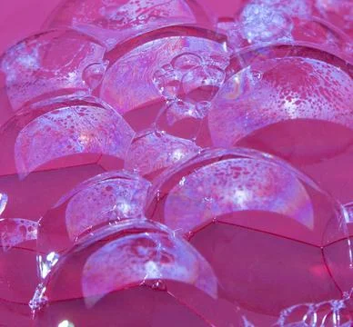 Soap bubbles on a red background, close-up, macro, pattern, texture Stock Photos