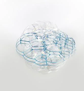 Soap bubbles with reflection on white background. Foto stock