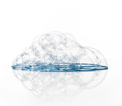 Soap bubbles with reflection on white background. Stock Photos