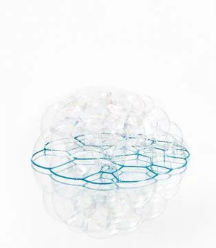 Soap bubbles with reflection on white background. Stock Photos