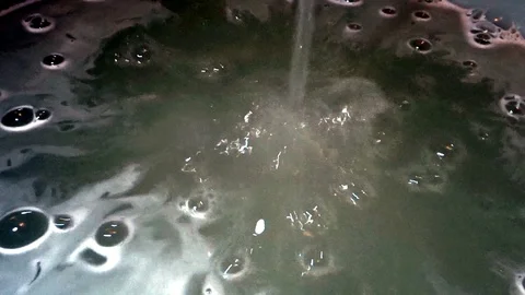 Soap bubbles from running water Stock Footage 87587511