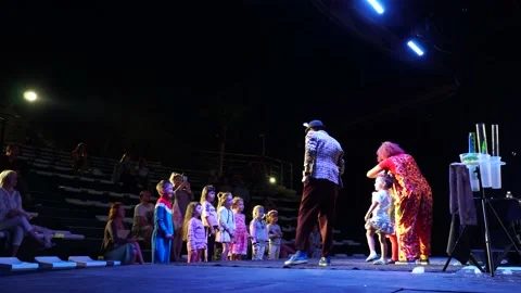 Soap bubbles show at a Turkish resort. Children watch and participate in the  Stock Footage 134251866