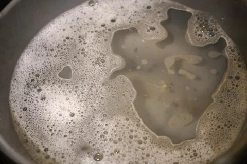 Soap bubbles in a sink Fotos de archivo