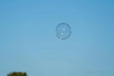 Soap bubbles with sky background. Stock Photos