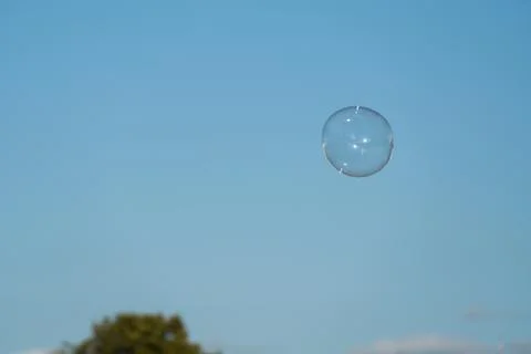Soap bubbles with sky background. Stock Photos
