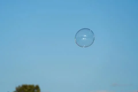 Soap bubbles with sky background. Stock Photos