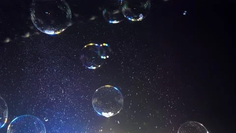 Soap bubbles take off and burst .soap bubble show Stock Footage 220076224