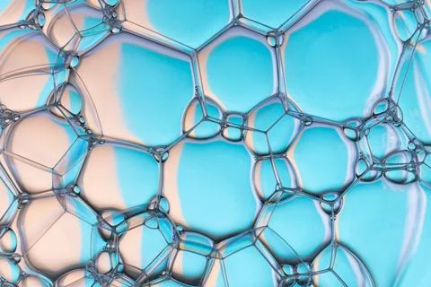 Soap bubbles on the water abstract background. Stock Photos