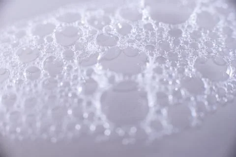 Soap bubbles on a white background Stock Photos