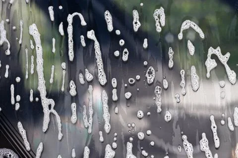 Soap bubbles on window Stock Photos