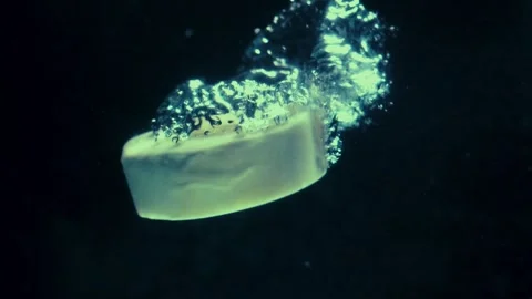 Soap Falls Against Black Backdrop Stock Footage 300884667